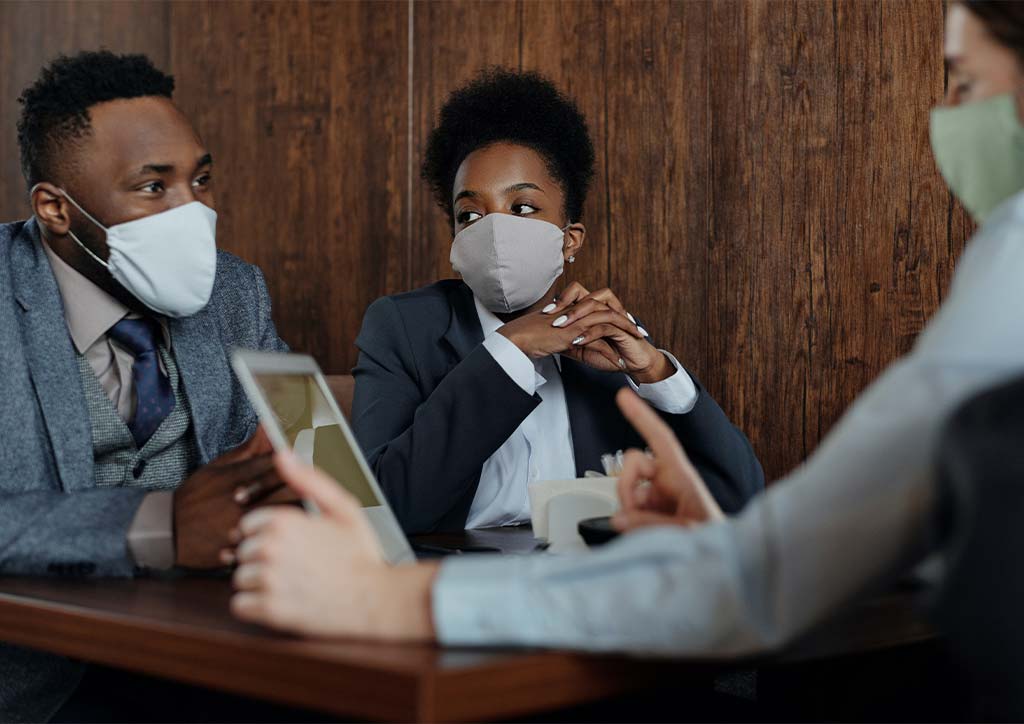 Employees discussing with management