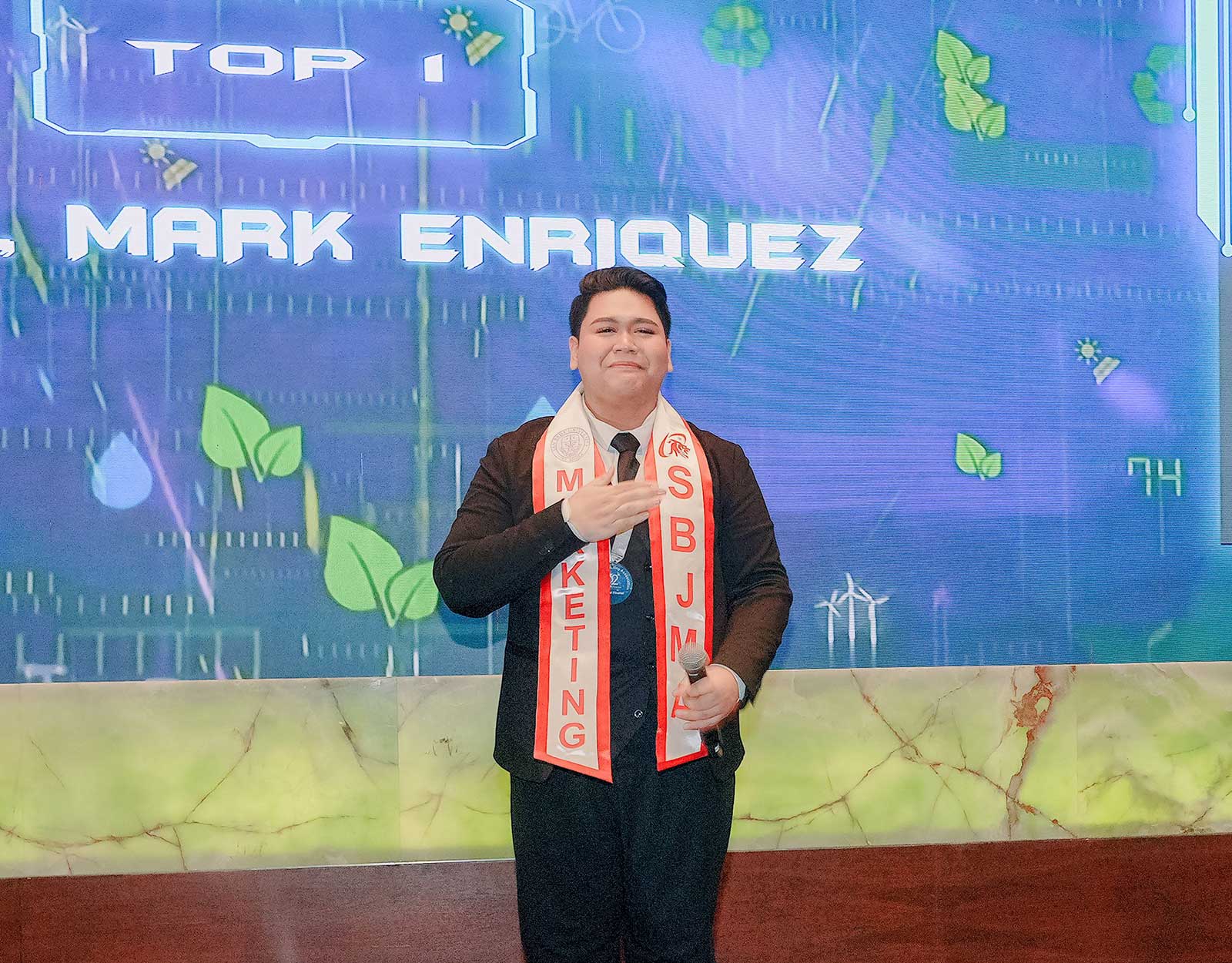 Mark Cruz from San Beda University was named class valedictorian and Best Marketing Student of the Year. 