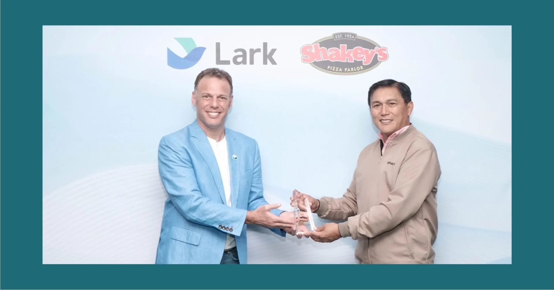 Shakey’s Pizza Asia Ventures Inc. and Lark announced in April 2026 its partnership for operational efficiency. In the photo are, from left: Mark Dembitz, General Manager for Lark APAC; and Vicente L. Gregorio, President and CEO, Shakey's Pizza Asia Ventures Inc.